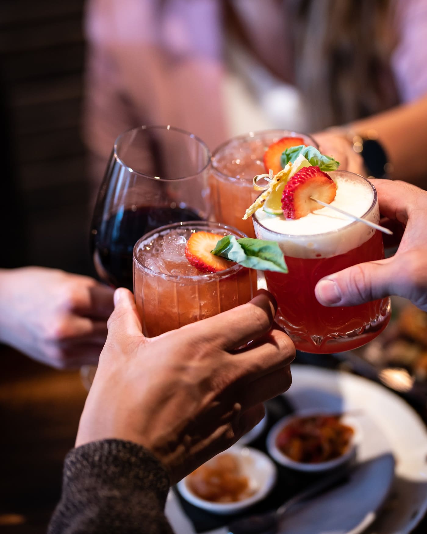 Cocktails and wine raised together at Notte