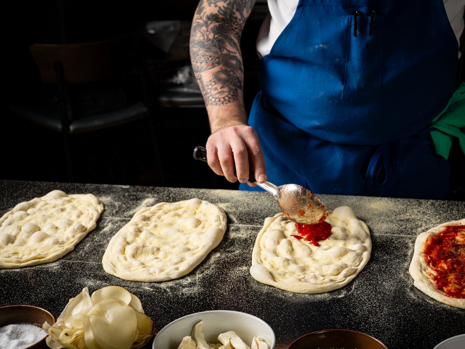 Pizzas being prepared at Notte
