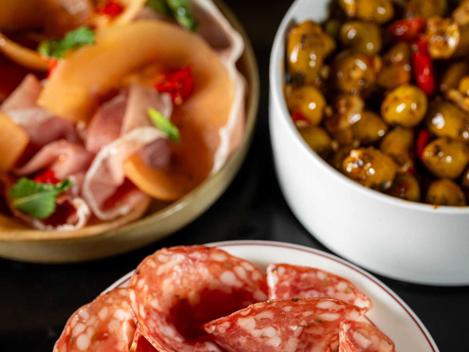 Salumi and olives served at Notte